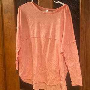 This is a pink oversized long sleeve t-shirt! It has been used a few times.